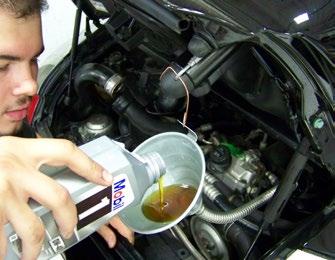 25 quarts) of engine oil at the fill neck. Do not add the oil too quickly.