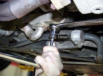 After all the oil has drained, reinstall the drain plugs and torque them to 30 Nm (22 ft-lb).