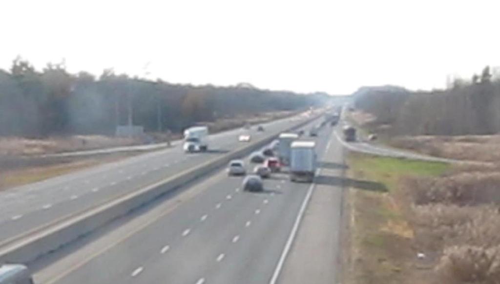 Figure 21: View showing that the lead tractor trailer has almost completed its lane change and the driver
