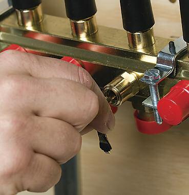 In smaller systems the manifolds and radiant tubing can be filled and purged with the