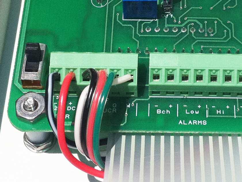 ELECTRICAL CONNNECTIONS: Transducer wiring: If your electromagnetic sensor is not yet connected to the electronics control panel, open the panel, and use the next figure as a guide to make the proper