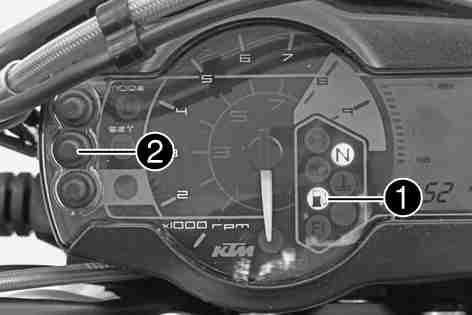 175) 400405-10 Close the filler cap. ( S. 39) Press the SET function button for 2 seconds. The fuel level warning lamp switches off.