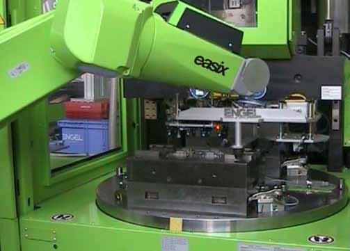 Wholly efficient system Machine + robot Focus on automation The injection moulding machine is in many cases only one element of the overall, often complex production cell.