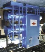 This 90 kw horizontal circulation heater package preheats fuel oil before burning. This 80 kw multiple chamber assembly preheats fuel oil.