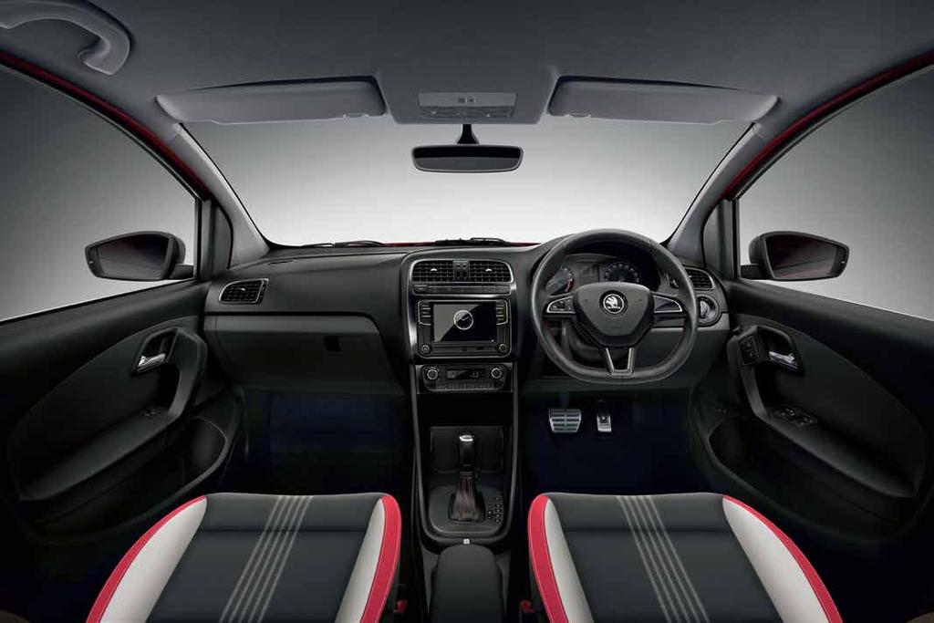 ROLL OUT THE RED CARPET INSIDE The Rapid Edition's interior is a blend of sportiness, spaciousness and comfort. The sporty character of the vehicle is reflected in the pleasing details.
