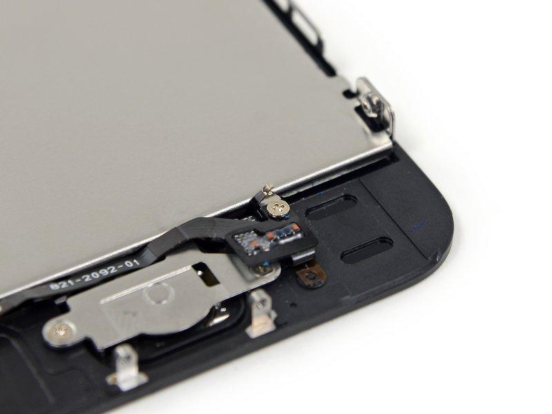 During reassembly, ensure the contact is in the correct orientation on the side of the screw nearest the LCD.