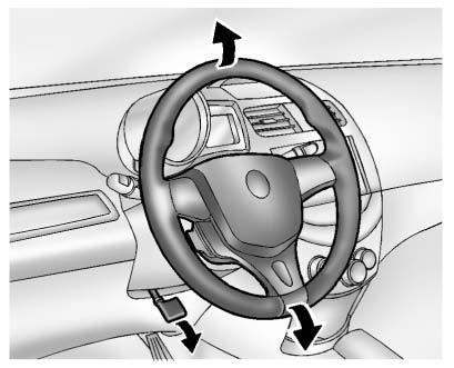 5-2 Instruments and Controls Controls Steering Wheel Adjustment To adjust the steering wheel: 1. Pull the lever down. 2. Move the steering wheel up or down. 3.