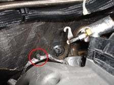 Once EGR system is pulled slightly forward, there is a clip holding a wiring harness to the back side of the