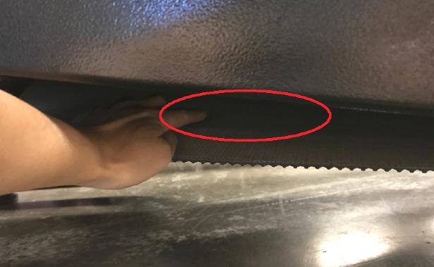 Inspect the underside of the belt, run your hand along the underside of the belt to check for excess residue buildup (Fig. 2). Fig. 1 3.