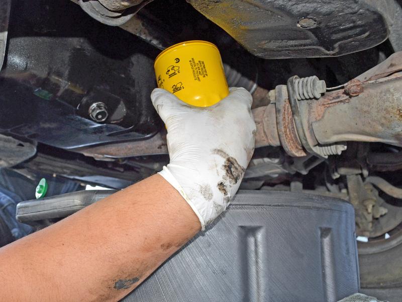 If the filter is too tight to loosen by hand, use an oil filter wrench.