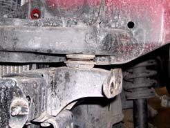 Loosen, but DO NOT REMOVE, cab mounting bolts on driver side. Rear Bumper c.