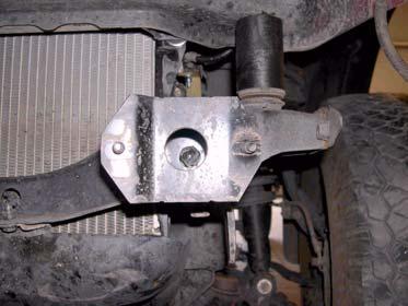 g. If equipped, remove two bolts, four brackets, and oil cooler from core support and crush zone. Allow oil cooler to hang on hoses. b. Release nine clips and remove two turn signal connectors.