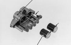 Measure te caliper piston O.D. SERVICE LIMIT: 26.89 mm (1.0587 in) Ceck te caliper cylinder bores for scoring or oter damage.