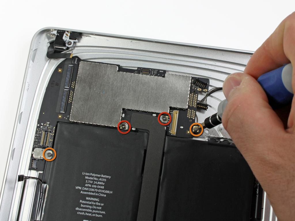Pull the headphone jack ribbon cable toward the left side of the ipad to disconnect it