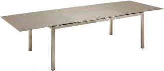 5 4562 : arge Extending Table Brushed stainless steel frame with slate satin finish glass table top. Extension leaves fold and store under table top.
