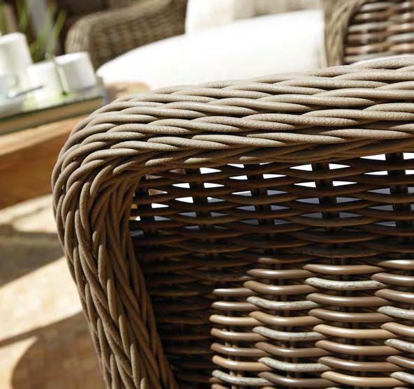 Teaming naturally textured, braided arms with variegated willow colored all weather wicker over a cleverly designed 'invisible' powder
