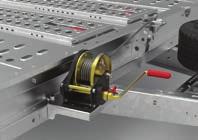 Safety and security of the transported spare wheels is provided for by a unique strap system and a plastic coated cable with