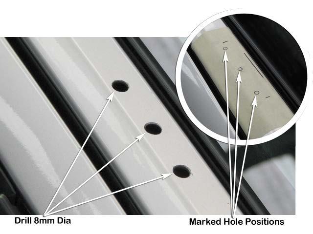 Mark the three mounting hole positions with a felt tip pen. 8 Drill a pilot hole at each of the three marked hole positions.