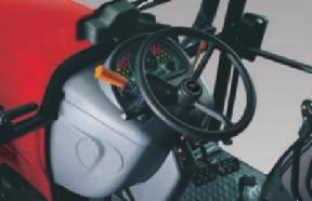 The DE-CLUTCH CONTROL (orange pushbutton integrated in the gear lever) and the REVERSE POWER ( hydraulic reverse shuttle with