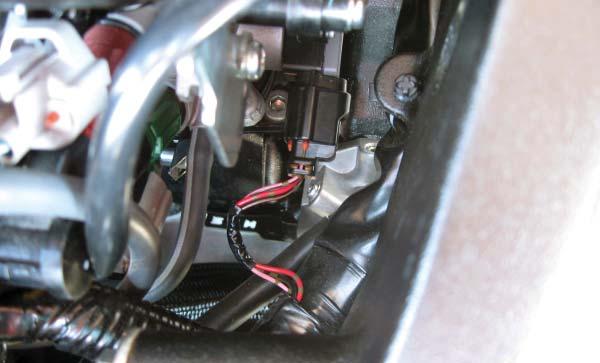 FIG.D 8 Locate the throttle position sensor (TPS) connector on the far right hand side of the throttle bodies as shown in