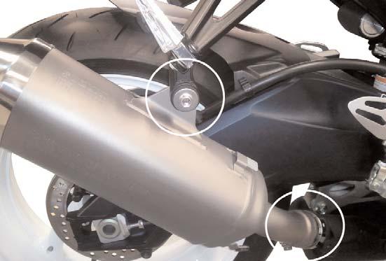 1) Make sure the motorcycle is cool and place securely on a service lift or center stand. 2) Remove both the left and right lower fairings.