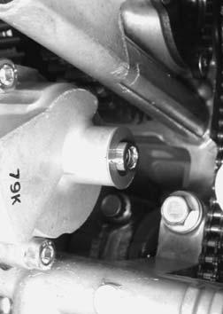 Refer to Oil Pan / Oil Strainer / Oil Pressure Regulator Removal and Installation (Page E-6).