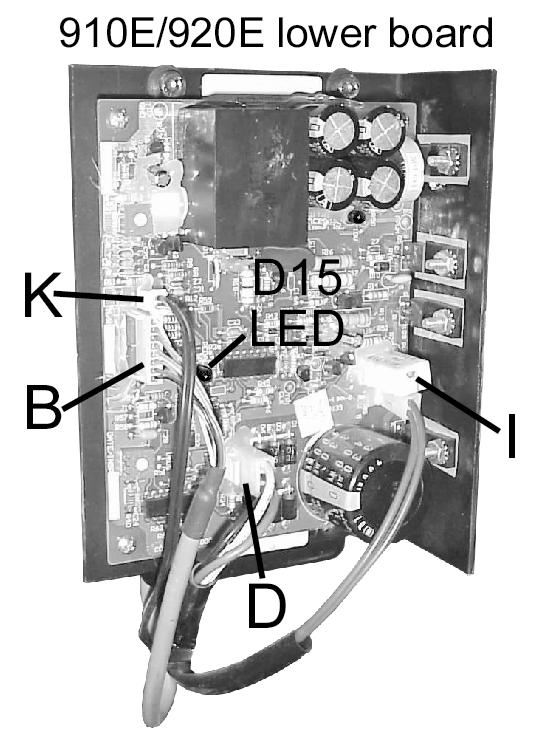 Disconnect the eight-pin cable from the lower control board B.