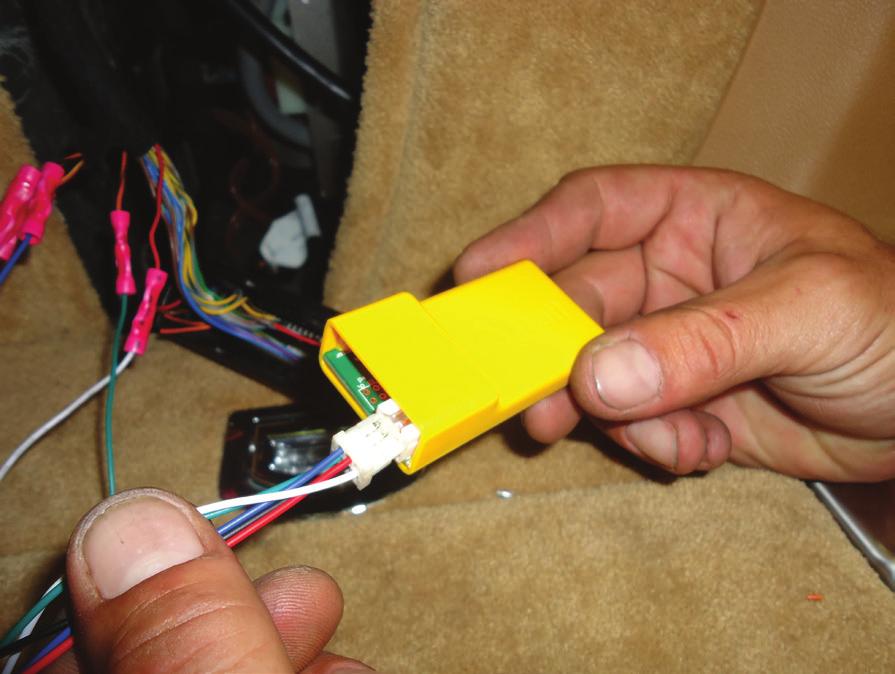 6. PLUG THE WIRING HARNESS INTO THE ELECTRONIC BYPASS MODULE.