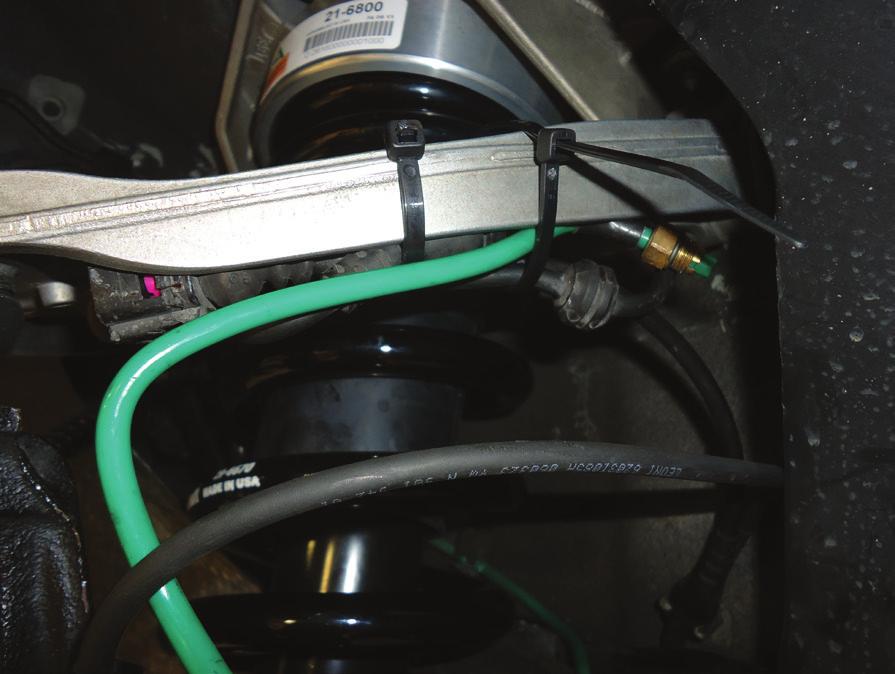 7. SECURE THE AIR LINE AND SHOCK DAMPER SENSOR WIRE IN A SUITABLE LOCATION. (FIGURE 20-7) FIGURE 20-7 8.