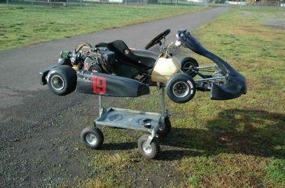 Introduction Kart racing is a variant of open wheel motorsport with small, open, four wheeled vehicles called karts. They are raced on scaled down demanding pavement circuits.