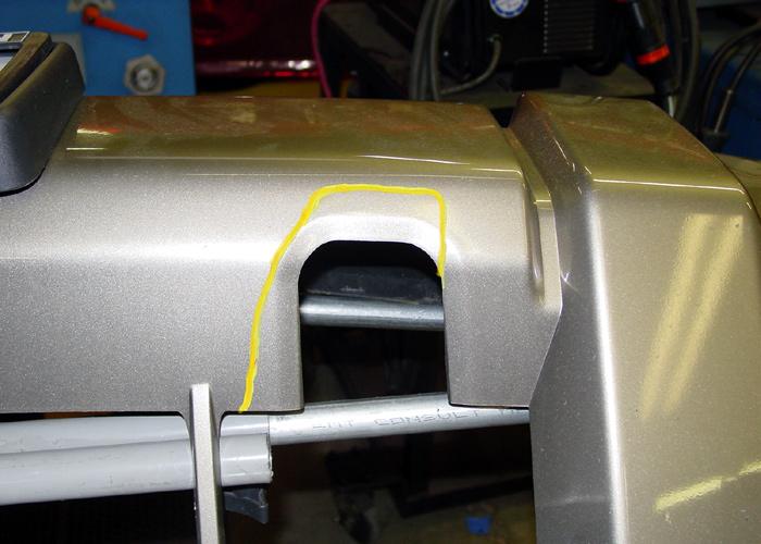 Reattach the two frame rail covers you removed in step 9. 26. To accommodate the receiver arms, trim the fascia on both sides. Refer to the yellow marker lines for correct trimming (Fig.Y) 26.