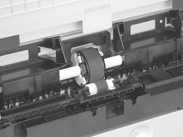 3. Release the roller holder to release the roller-locking pins. Remove the separation roller.