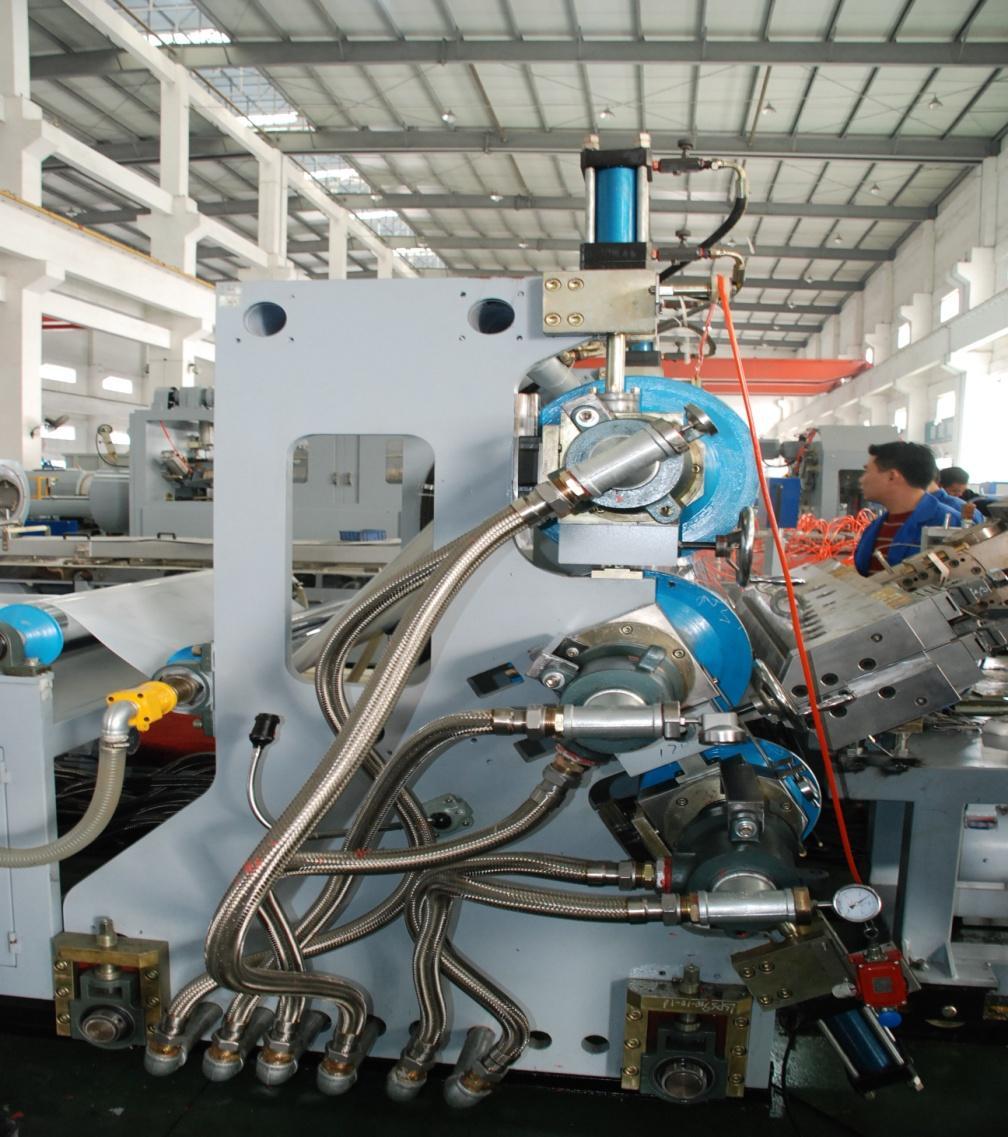 Tri-barrel polishing machine Press roller: Ø 316 mm x 1200 (W) mm, rigidit:hrc49-51 Middle roller: Ø 415 mm x 1200 (W) mm, Cooling roller: Ø 415 mm