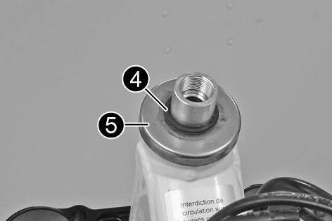 Remove screw. Take off the upper triple clamp with the handlebar and set it aside. F00055-10 Cover the components to protect them against damage. Do not kink the cables and lines. Remove O-ring.