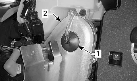 Pull airintakesilenceroutofadapterplate. Driven Pulley Removal 1. Remove RH side panel. 2.