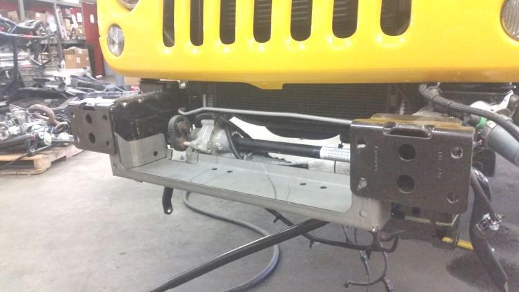 time. 9. Install EVO Pro Series Winch Plate.