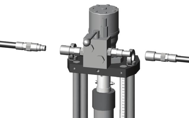 Lower the shell cutter to the pipe by using the removable handles placed on the head of the drilling machine, turning them clockwise until contact is made with the pilot drill on the pipe.
