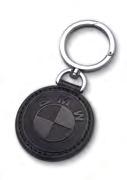 High-quality key ring with model-specific lettering, featuring painted BMW logo. Material: stainless steel, aluminum logo. Dimensions: 4.6" x 0.6". Made in Germany.
