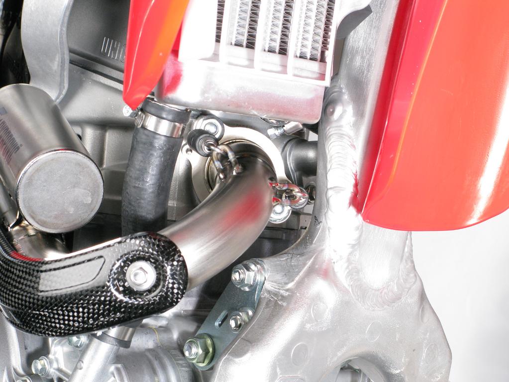 www.akrapovic.com 4. Insert the header tube into the sleeve, attach the springs and tighten the nuts to a specified torque (Figure 9).
