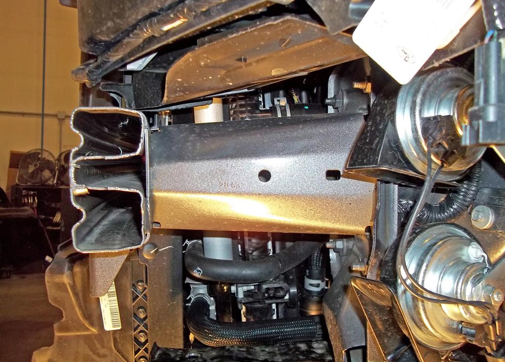 bottom and top of the sub frame (Fig.K). 9.