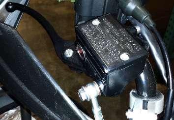 Right Hand Controls FEATURES & CONTROLS 1 Front Brake The front brake lever is located on the right handlebar and controls only the front brakes. Pull it toward the handlebar to apply the front brake.