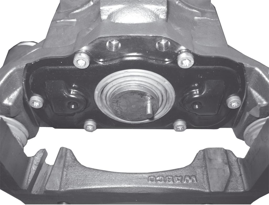 MAXX TM 22T Replacing the brake linings Use a wire brush to clean pressure plate, lining slots and pressure plate guide on the brake caliper and remove any corrosion on