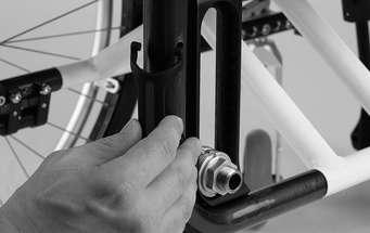 2) Hold the vertical accessory mount against the inside of the frame tube with the rounded side towards the