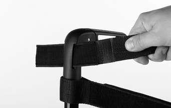 5) For adaptable back upholstery: Mount the uppermost strap on the push handle and secure with hook-and-loop fastener (see Fig. 77). 6) Put the back pad back on. 76 77 3.8.1.
