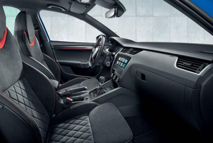 The upholstery is in a combination of Alcantara leather with red