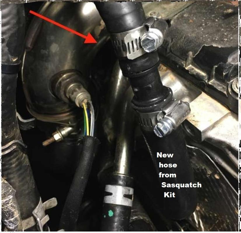 Phase 2 Installation Instructions Step 25: Go back to where you removed the lower coolant line in step #15 from the hard line and using one of the provided hose clamps, fasten the supplied hose, part
