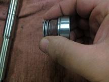 3. Remove the Oil Seal and Thrust Bearing Assembly from Shaft (includes the Thrust