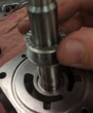 Press seal onto large end of shaft with seal lip facing out.