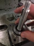 2. Install the spacer over the shaft and into the bearing bore.