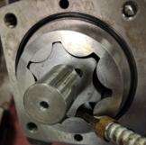 Using a 6 mm Allen wrench, tighten Cap Screws alternately and evenly in a crisscross pattern